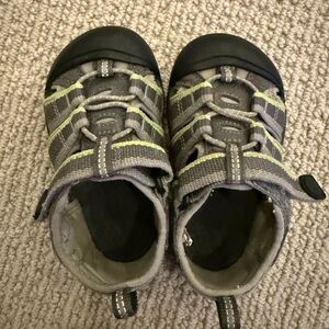Gray and Green Keen water shoes